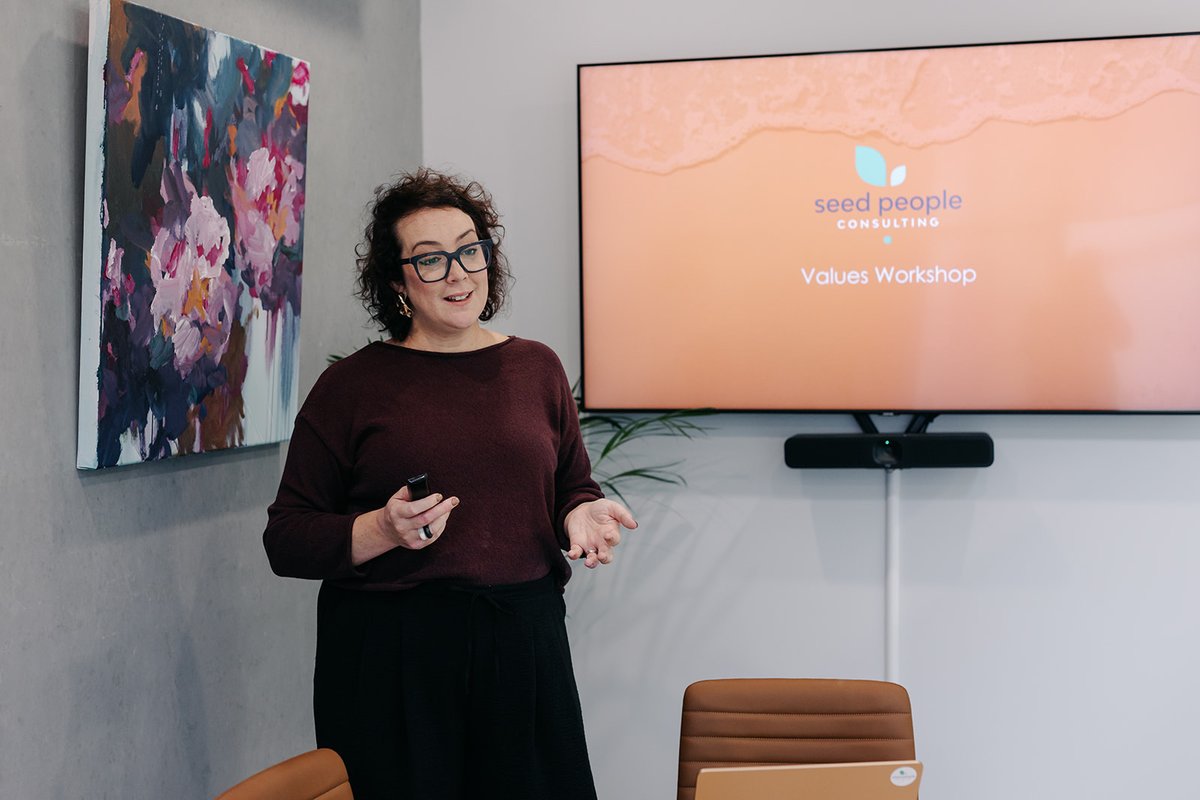 Julia Fiore of Seed People Consulting facilitating a Values Workshop — the day-to-day moments where self-aware leadership shapes team culture.